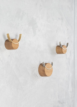 Wall hook DEER | oak wood, brass Biotite